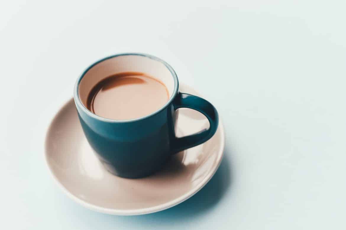 cup of coffee with saucer